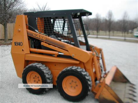 case 1840 skid steer wheels|case 1840 quick attach.